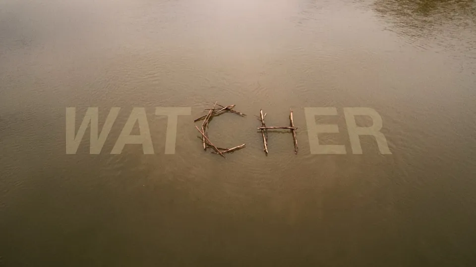 WATCHER title card, letters made of sticks floating on water