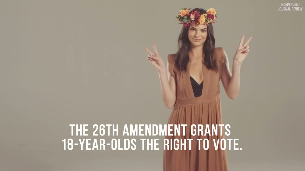 Kendall in a flower crown making a peace sign: The 26th Amendment grants 18-year-olds the right to vote